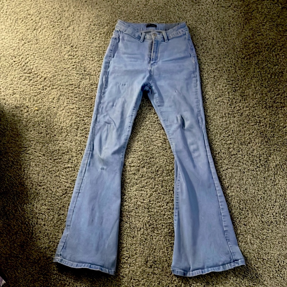 Light blue bell bottom jeans (alittle worn)